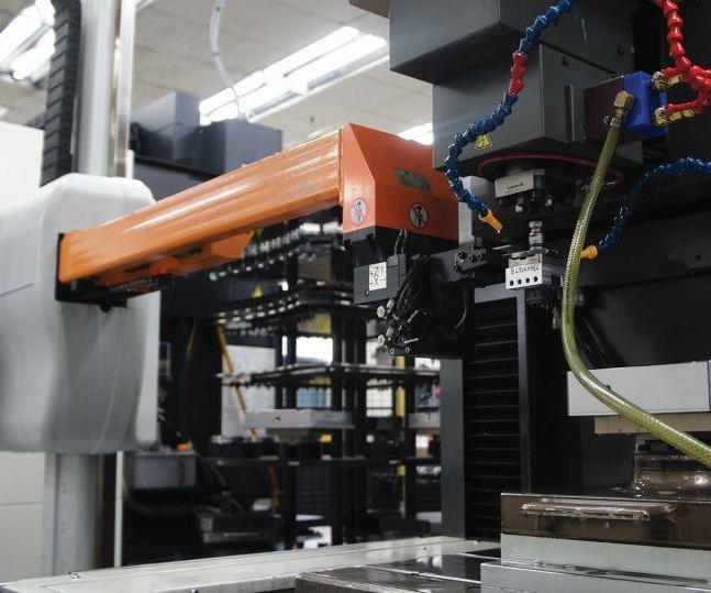 Omega’s System 3R Workmaster carousel robot loads a pallet-mounted, pre-referenced electrode into a Mitsubishi EA-12V ram EDM unit. The workpiece on the table interfaces with the System 3R fixturing system via a custom sub-pallet.