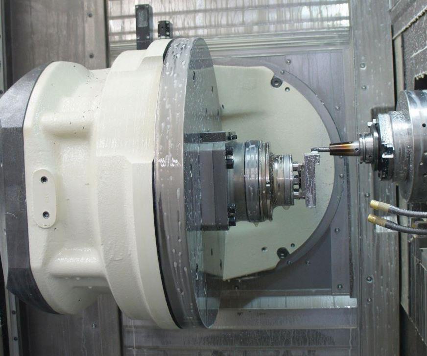 The Grob G350’s horizontal, retractable spindle and single-sided, 180-degree trunnion ensure a spacious workzone. Its 202-position toolchanger is loaded with a standardized selection of cutters, all of which are guaranteed within 10 microns, mounted in shrink-fit holders and tied to material-specific parameter settings within the shop’s CAM software tool library. Specifiying the table without T slots evidences Omega’s commitment to eliminating process variation.