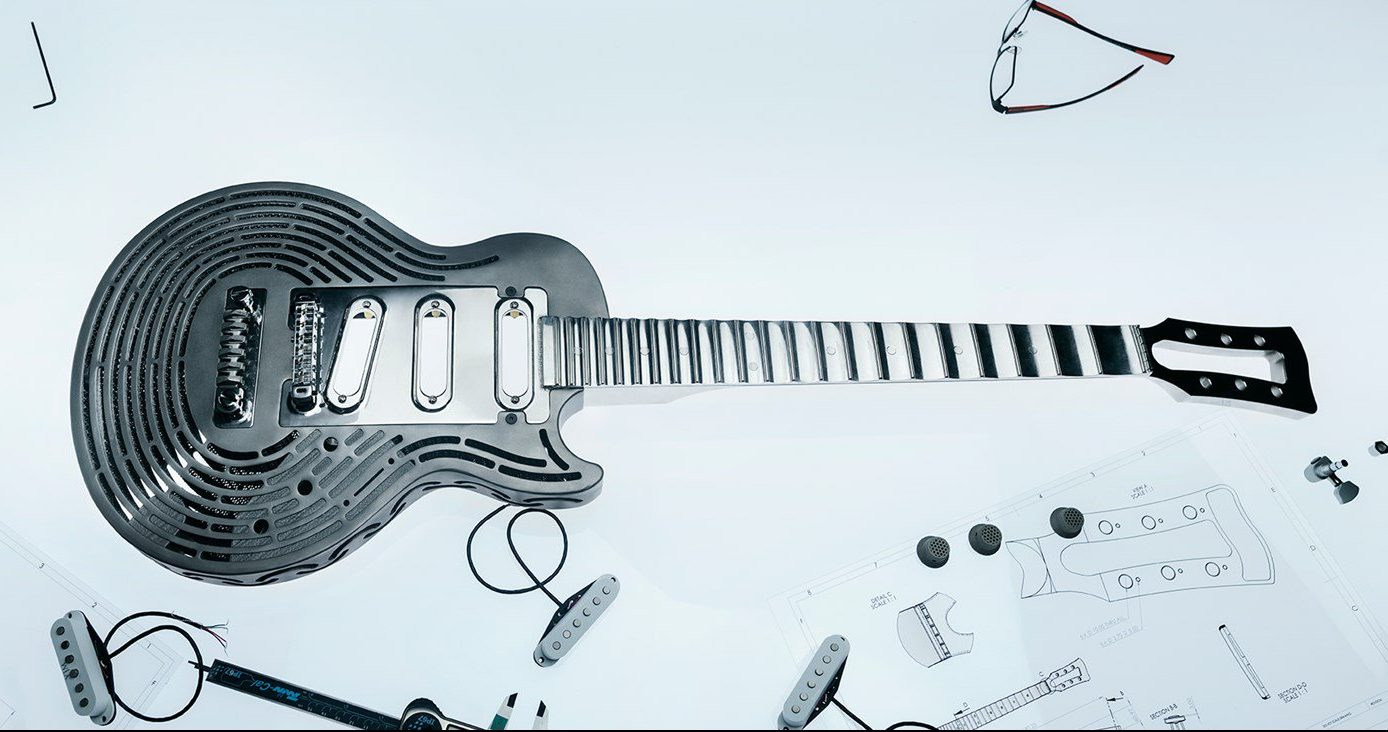 Sandvik 3D Prints the World's First Smash-Proof Guitar lc-hero-article-2000–712136979-rszww1600h730-90