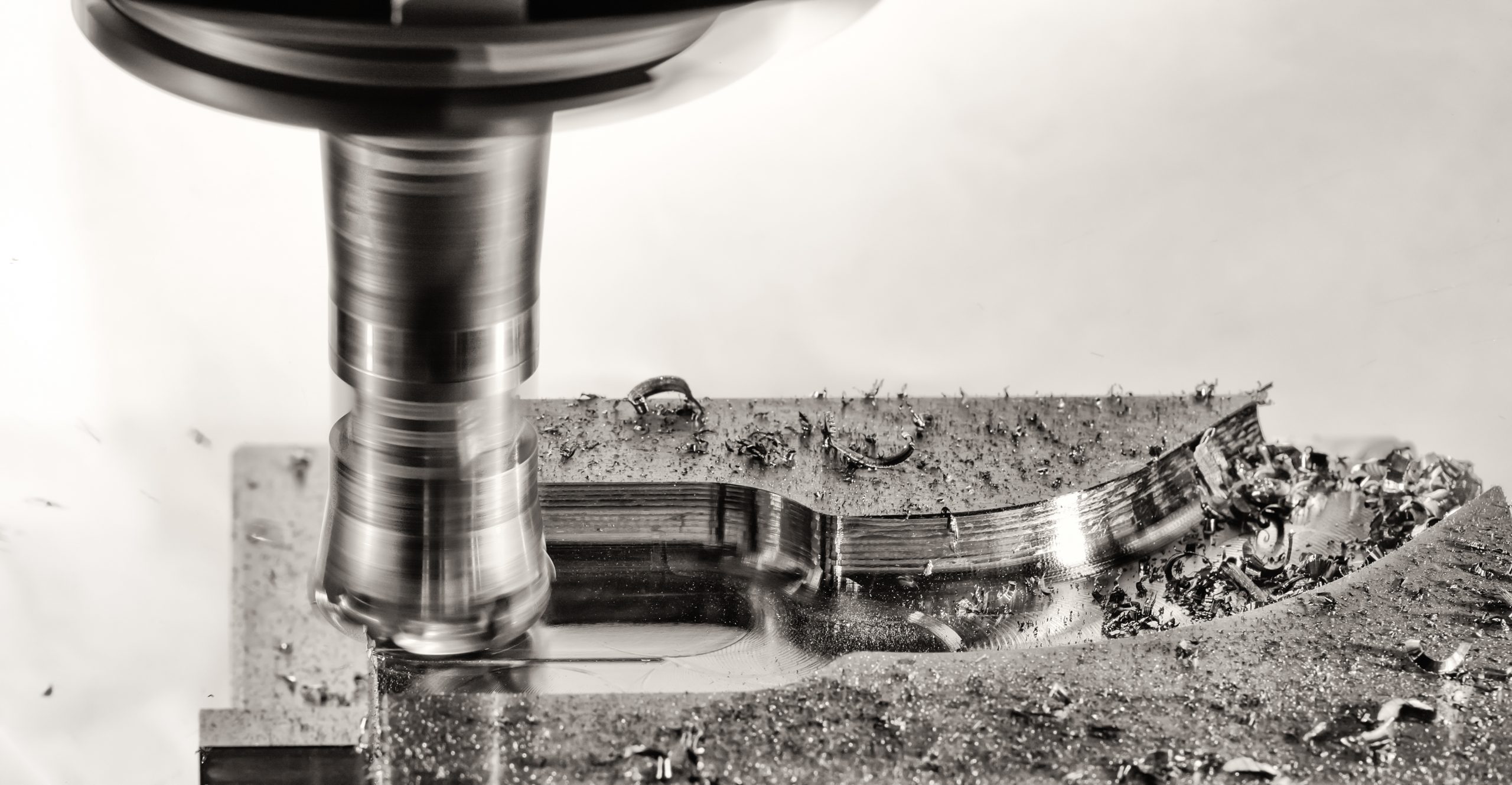 DRO: Everything You Need to Know Milling cutter work with splinters flying off, monochrome versio