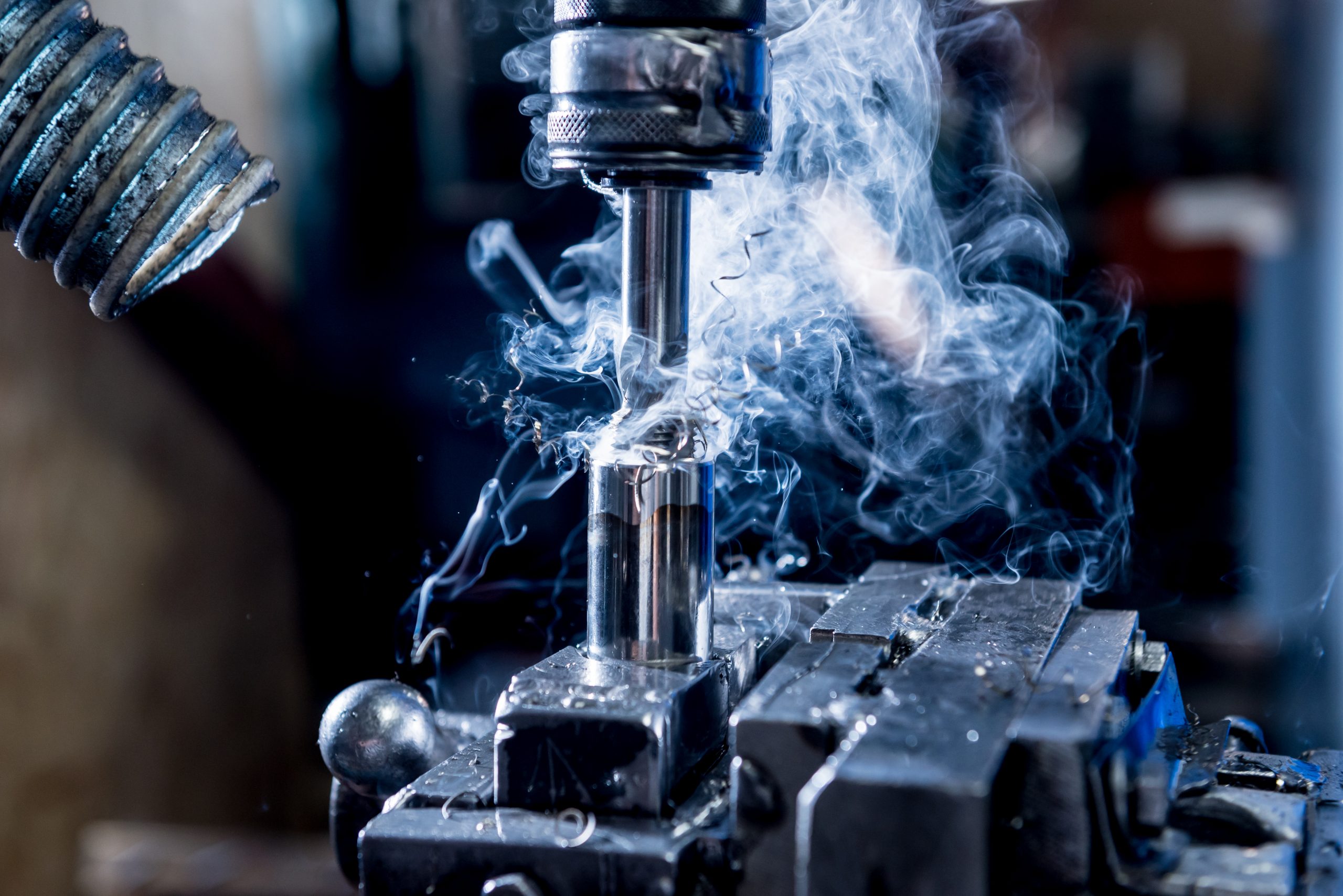 What's the Proper Way to Use a Tap Extractor? Drilling machine with drill bit for tapping.